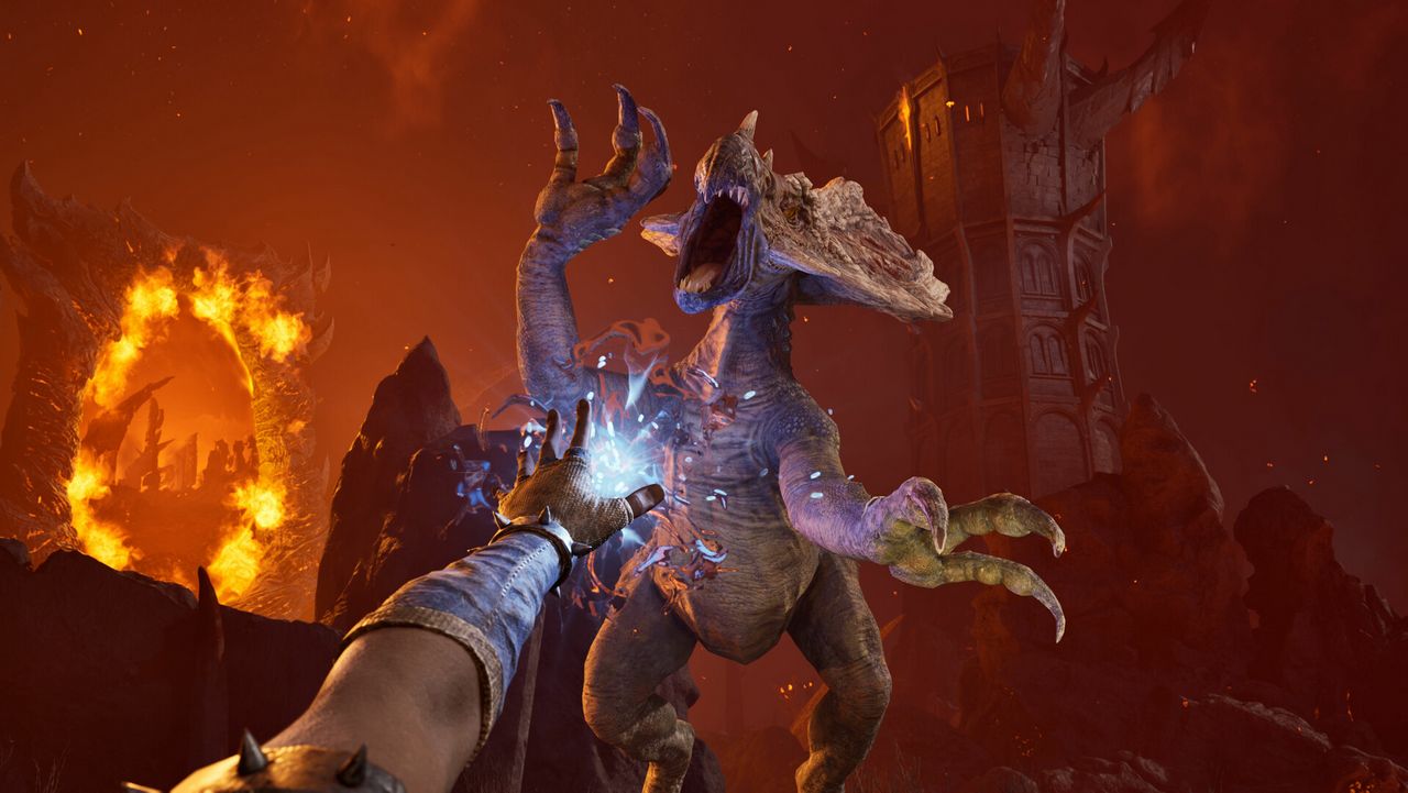 Une porte d'Oblivion embrasée et un daedra dans les Terres mortes